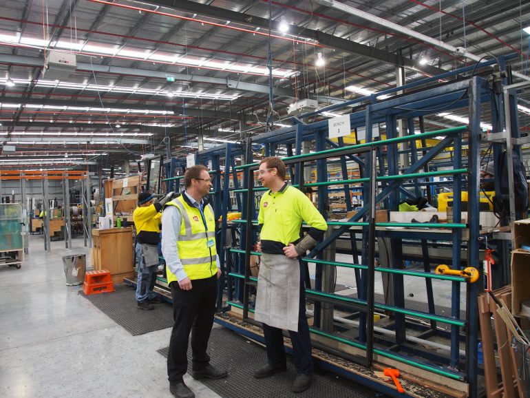 A&L windows team members in factory