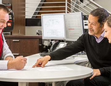 Couple looking over plans