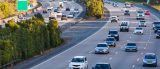 a wide view of many cars on a highway